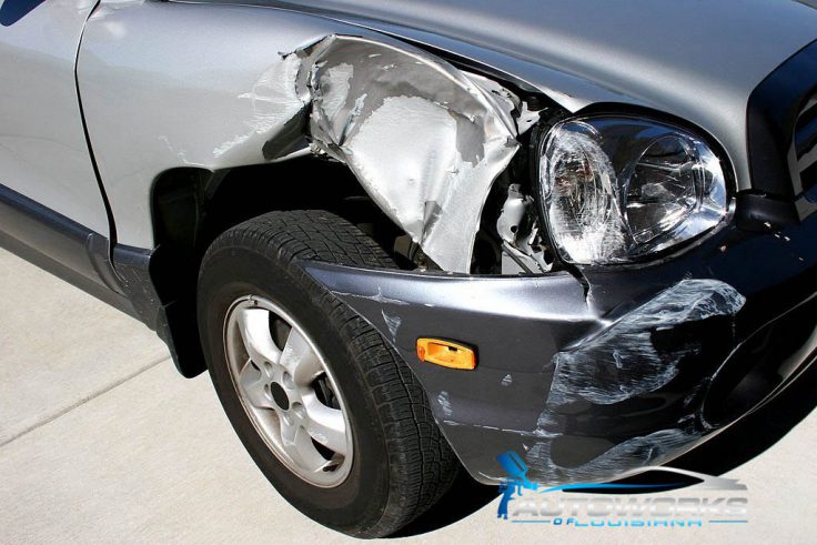 Skilled technicians performing collision repair"