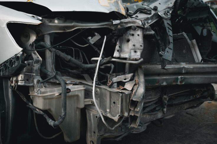 Close-up of front car accident damage