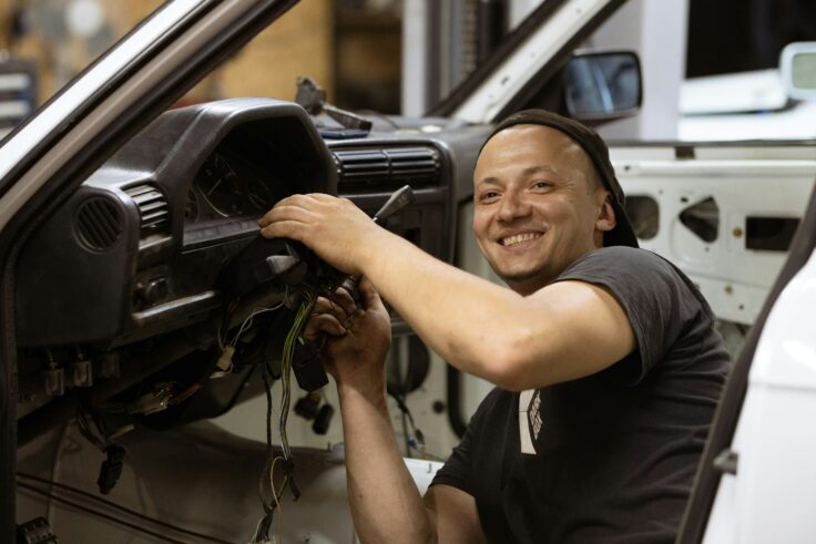 Mechanic repairing a steering wheel