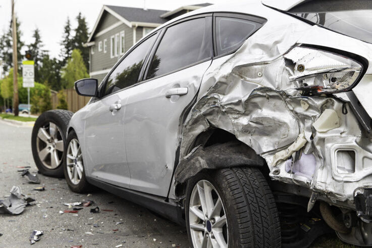 Serious car crash scene with damaged vehicles